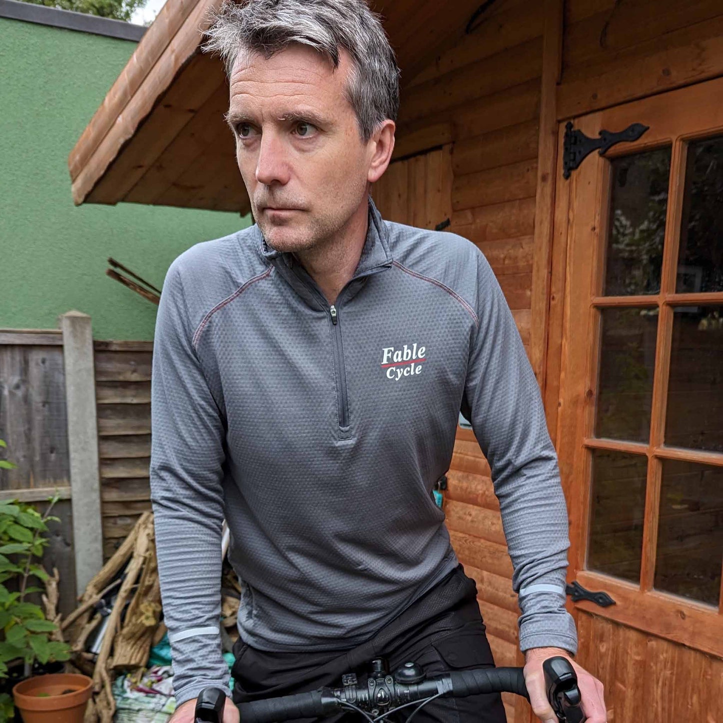 Fablecycle long-sleeve zip-up cycling top: turning on bike